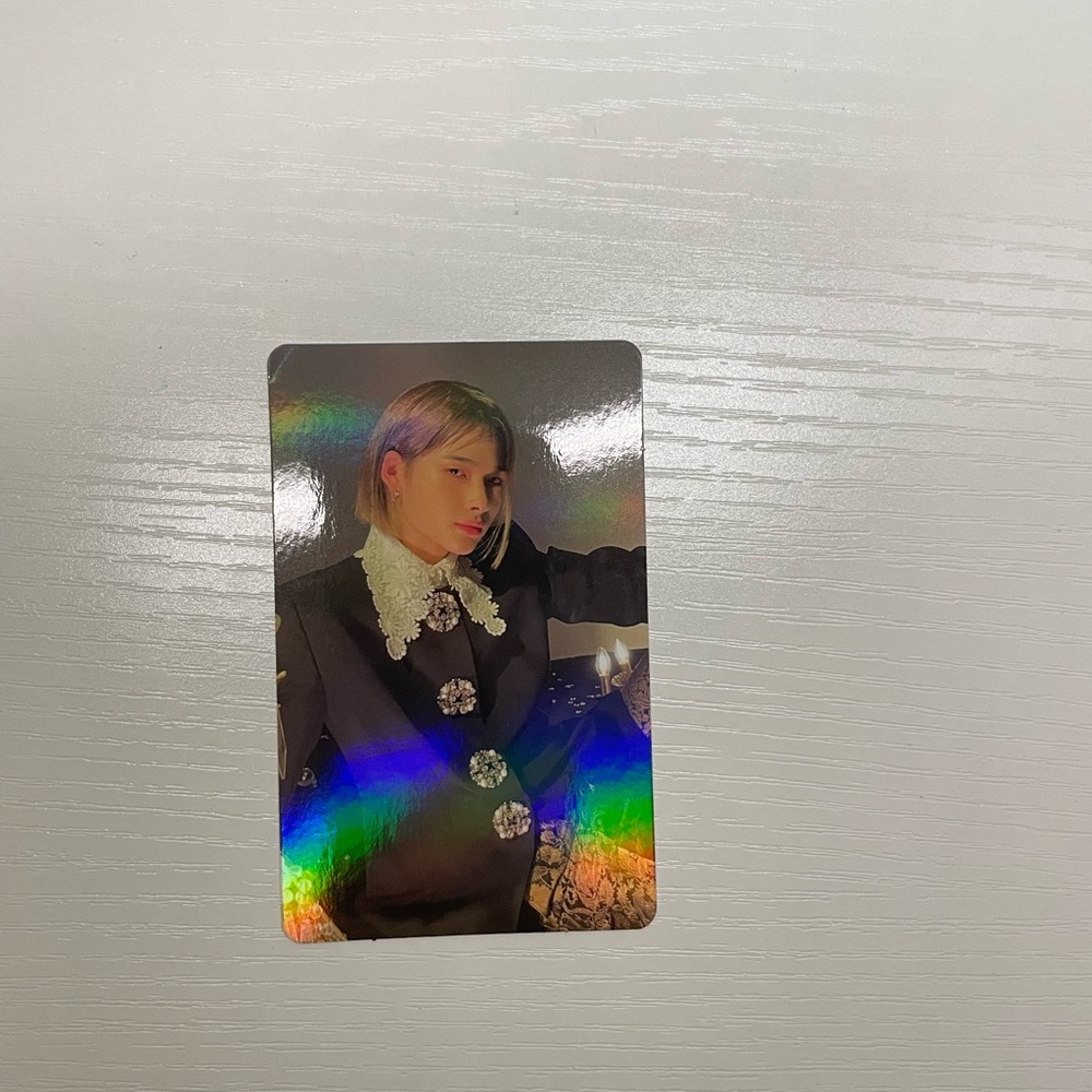 Niki from Enhypen photocard with halo graphic details